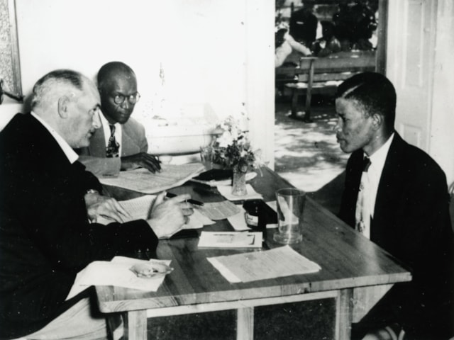 TfL Image - LT Reruiter Charles Gomm interviewing an early Barbadian applicant  1956