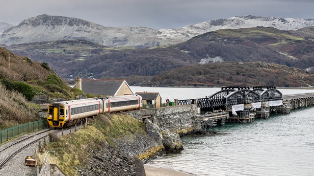 Celebration as Network Rail completes four-year £30m restoration of iconic Barmouth Viaduct: A train crossing Barmouth Viaduct, December 2023