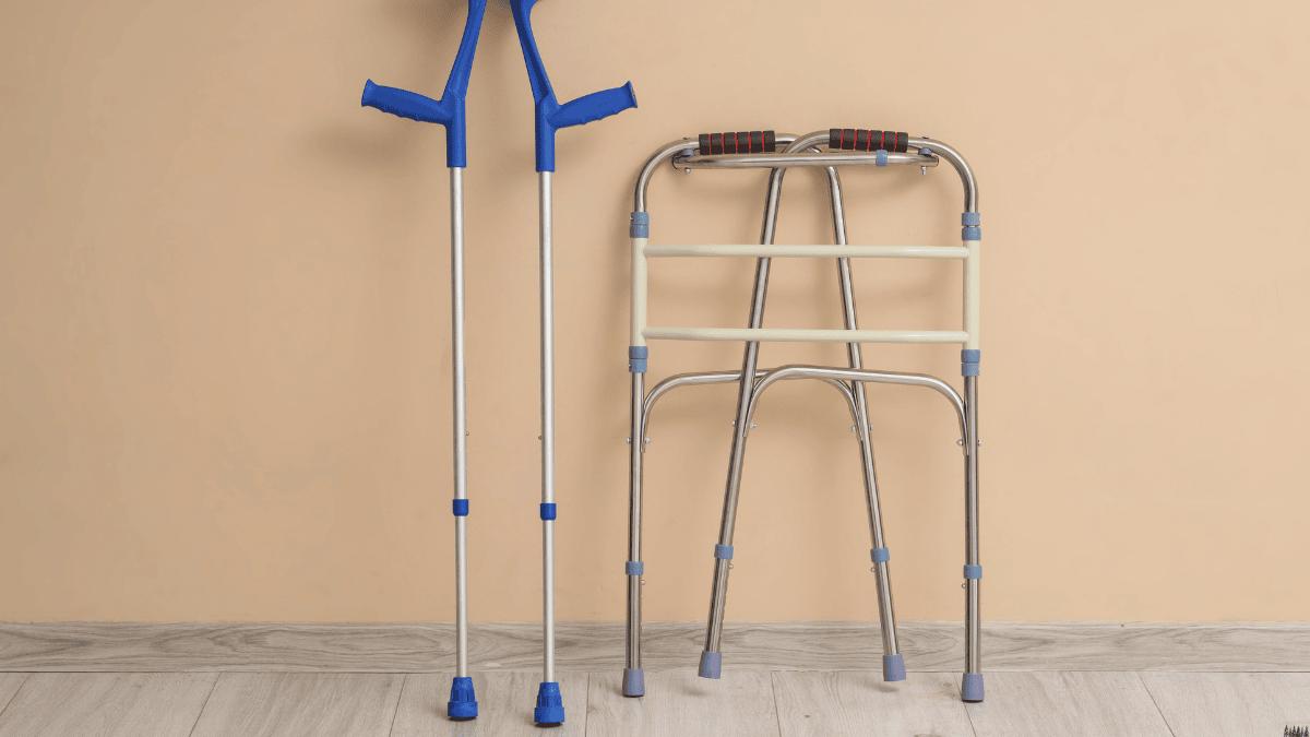 A pair of crutches and a walking frame