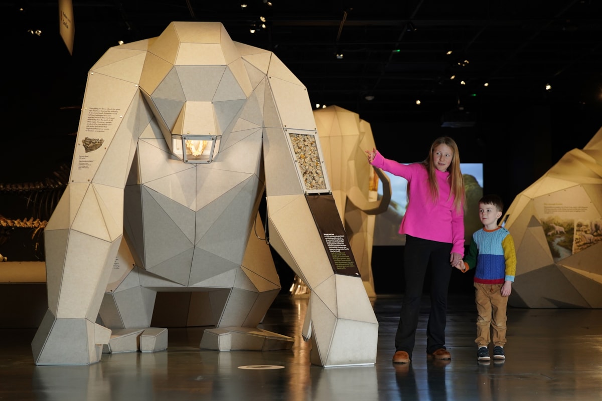 Connie Blacklaw (11)  and Arlo Cook (5) explore Giants at the National Museum of Scotland. Photo © Stewart Attwood