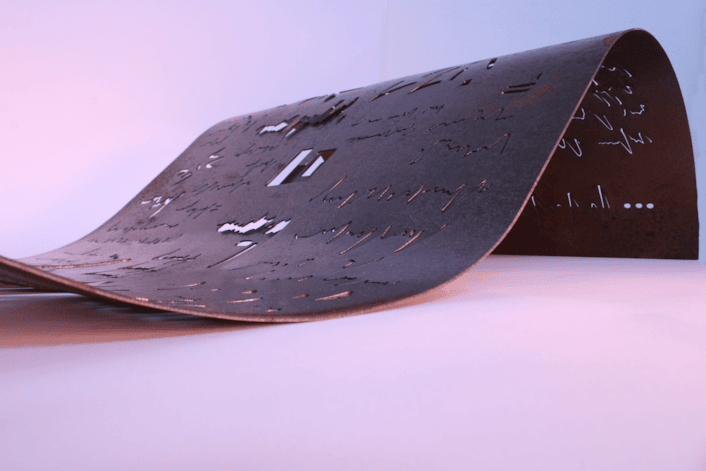 Accelerator Bursary: The work of Elrick Boldy (Leeds Arts University) explores the limits of communication through asemic writing – drawings symbolic of writing are rendered using plasma-cut steel, which is formed into curves and waves, then treated with rust-adjacent patina.
