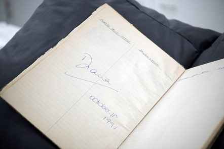 The Milestone House visitor book, open on the page the (then) Princess of Wales signed on her visit in October 1991. The visitor book is one of items that will be on display. 
Credit: with kind permission from Waverley Care.
