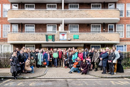 Attendees, including Blackstock estate residents, at the unveiling of the Andrea Levy plaque along with her family and friends