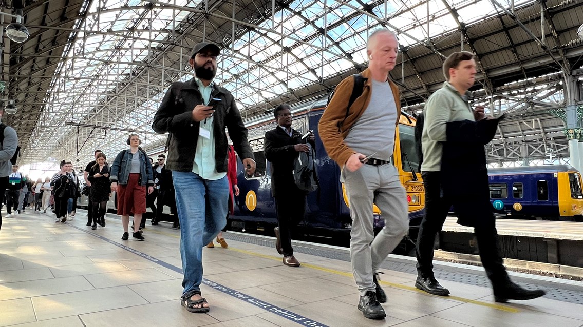 Manchester Piccadilly passengers on platform June 2022