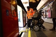 James Lee from TfL's Independent Disability Advisory Group uses a new mini ramp at Tottenham Hale station: James Lee from TfL's Independent Disability Advisory Group uses a new mini ramp at Tottenham Hale station