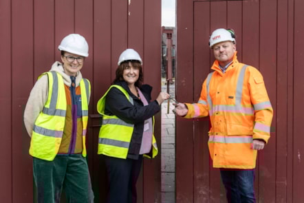 [L-R]: Helen Goddard and Elen Roberts of the National Slate Museum 'handover' the keys of the Museum to Eddie Williams of MPH LR.