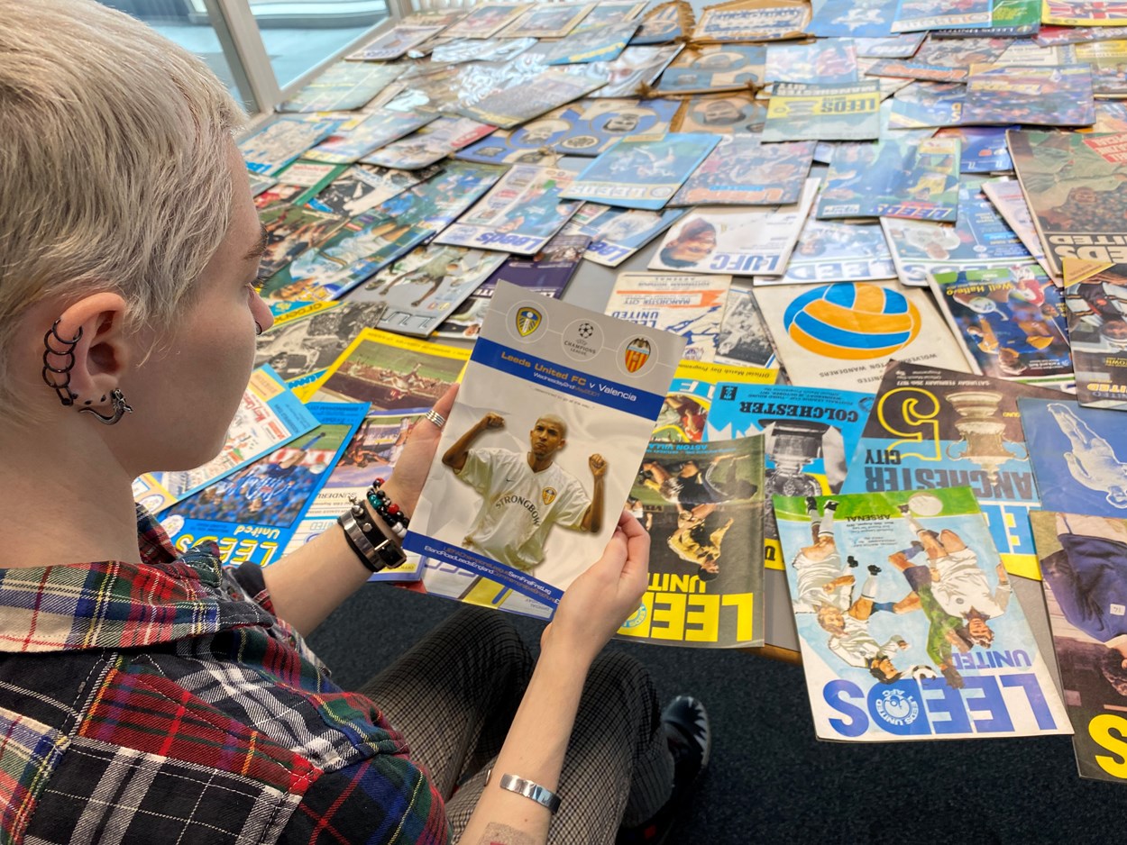 LUFC programme donation: Amy Thraves-Connor has been working on a placement with Leeds Museums and Galleries, scouring through boxes of the donated programmes, searching for those which help tell both the story of the club and how the team has influenced life in Leeds both on and off the pitch.