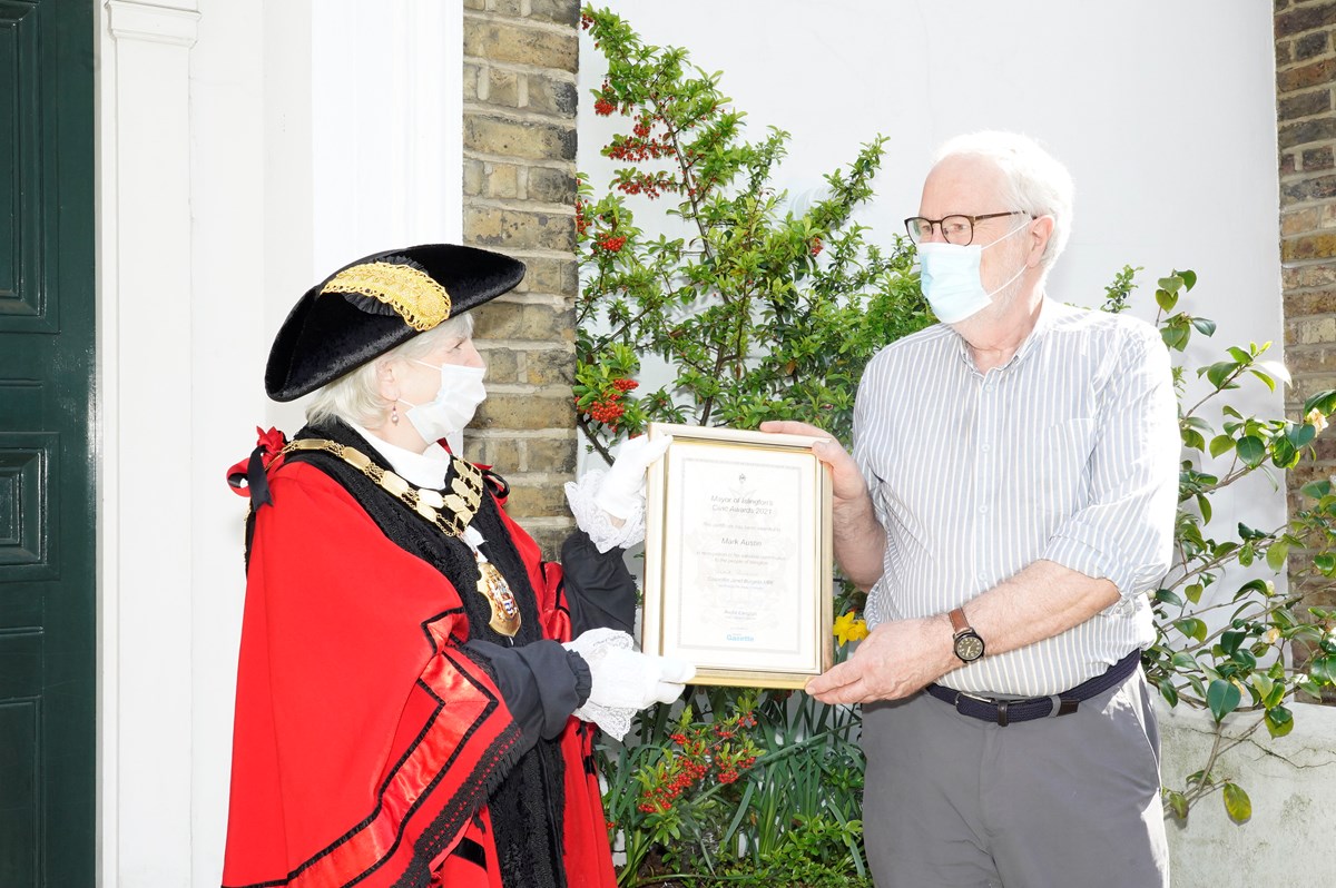 Mark Austin receiving his Civic Award from Islington Mayor Cllr Janet Burgess