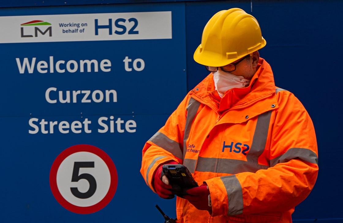 PODFather Curzon St image 2: HS2 worker at Curzon Street station site using PODFather technology.

Tags: Construction, Supply Chain, Workforce, Curzon Street, Innovation, Technology