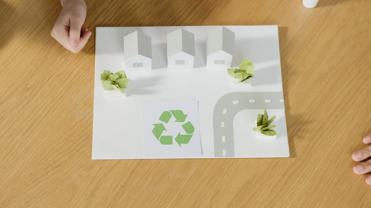 Recycle logo on road map