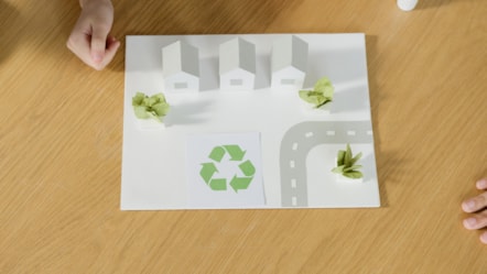 Recycle logo on road map
