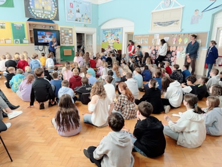 The current children of Aberlour Primary School listen to Head Teacher, Mandy Inkson, paying tribute to Hester Allan as she retires from the school after 26 years.