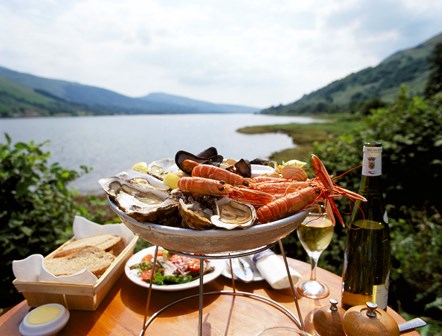 1050478 - Seafood platter with loch in background