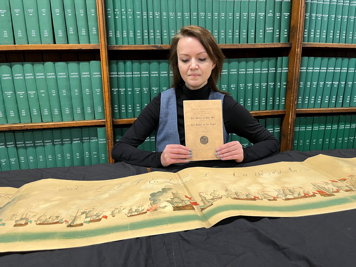 Leeds Central Library's naval battle: Leeds Central Library's senior librarian Rhian Isaac with sections of the step-by-step, illustrated account of the battles of Solebay and Texel which took place in the 1670s. Estimated to be more than 50 feet in length, the document itself dates from around 1908 and is among a collection of more than 3,000 books, pamphlets and periodicals donated by noted Leeds aristocrat, diplomat and naval history buff Sir Alvary Gascoigne.