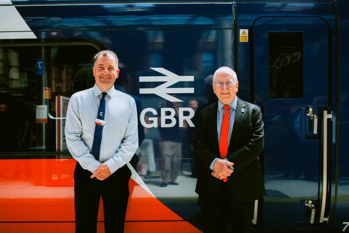 GBR Anglia - First GBR trains for Anglia 16.07.26-3: Peter, Lord Hendy of Richmond Hill, Minister for Rail and Jamie Burles, managing director for GBR Anglia standing beside a newly branded GBR train at London Liverpool Street station on Thursday 16 July 2026