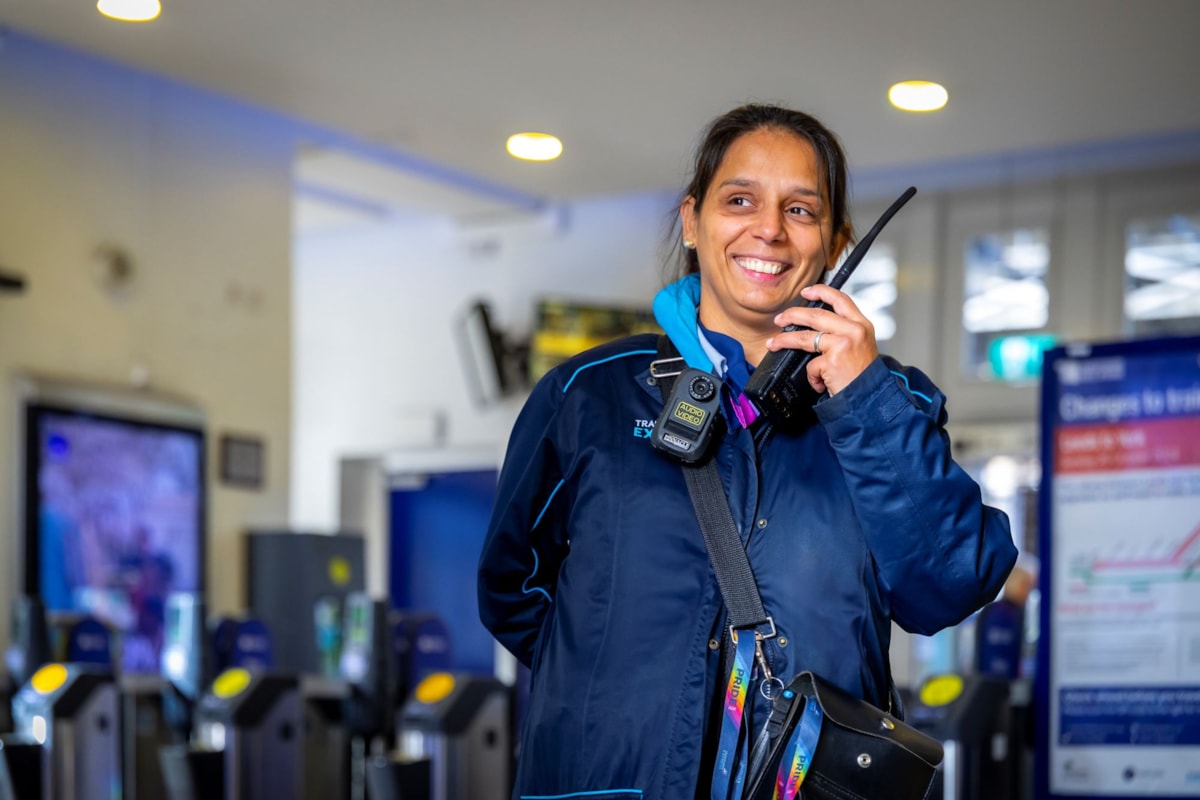 Image shows TPT employee with body-worn camera kit