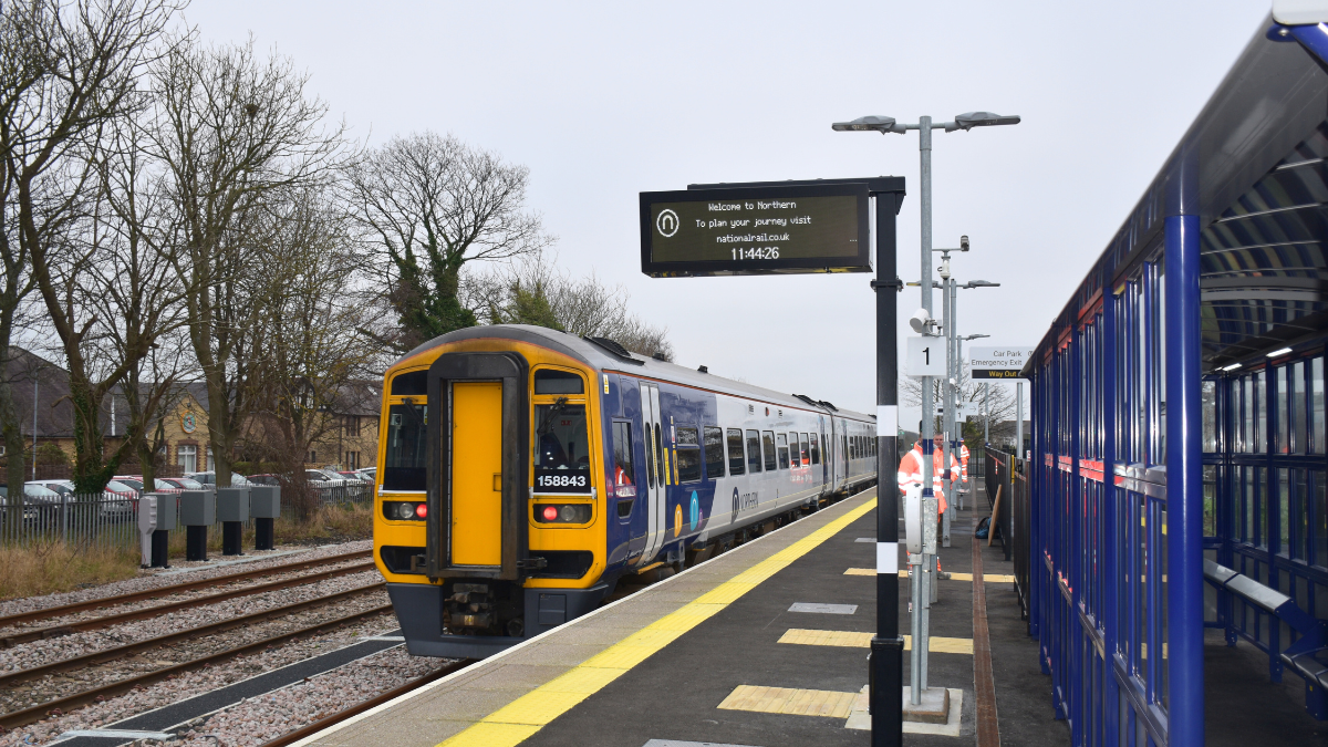 An image of a Northumberland Line train arriving at Ashington station