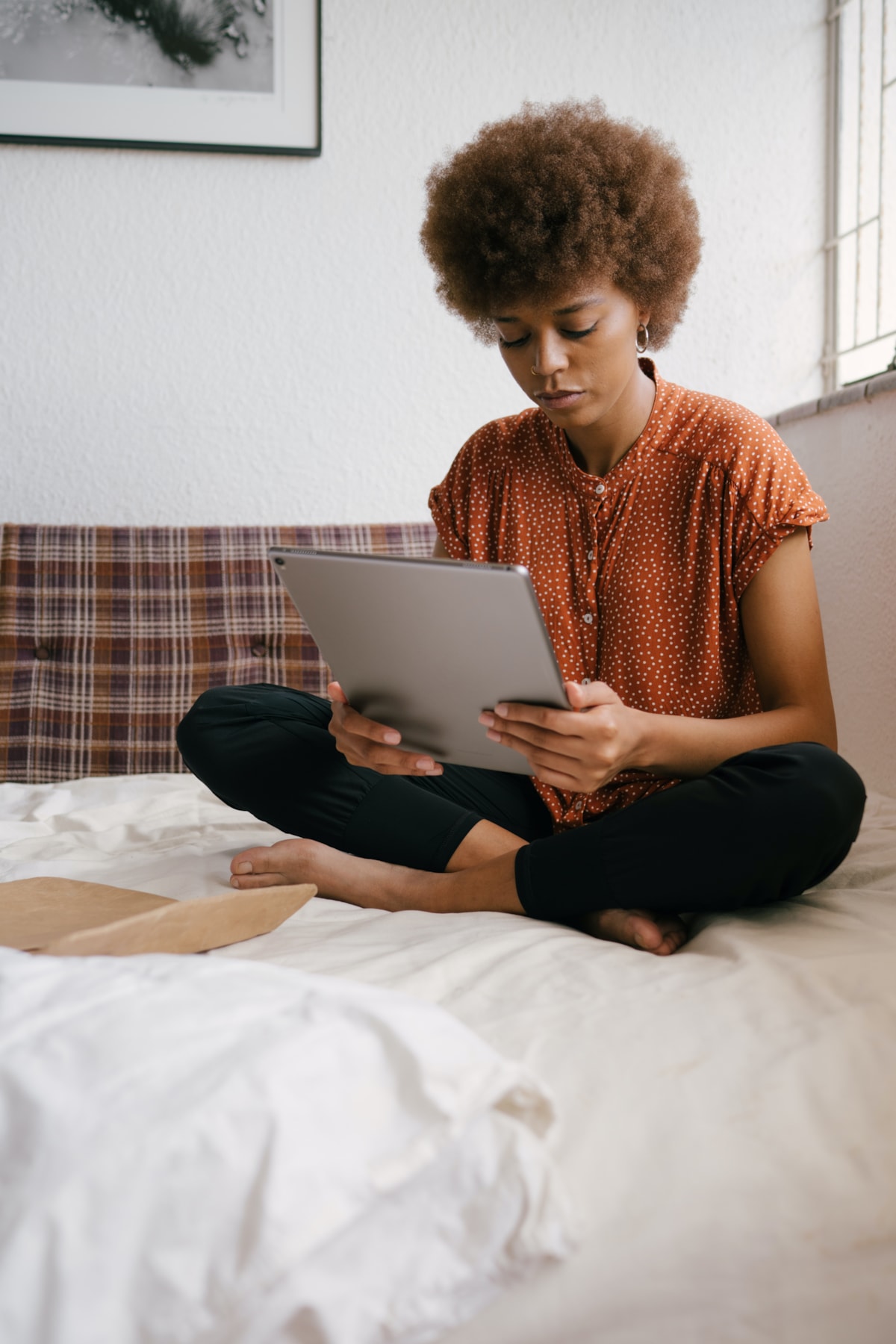 photo-of-woman-holding-tablet-3060659