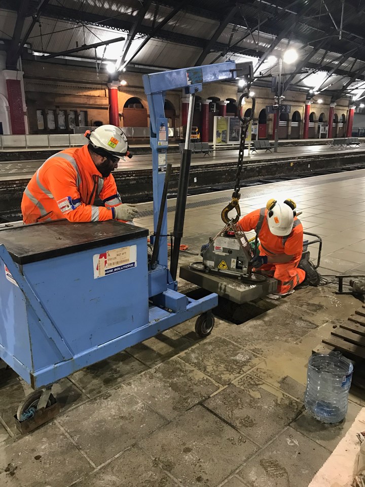 Lifting the historic Yorkstone into position at Lime Street station