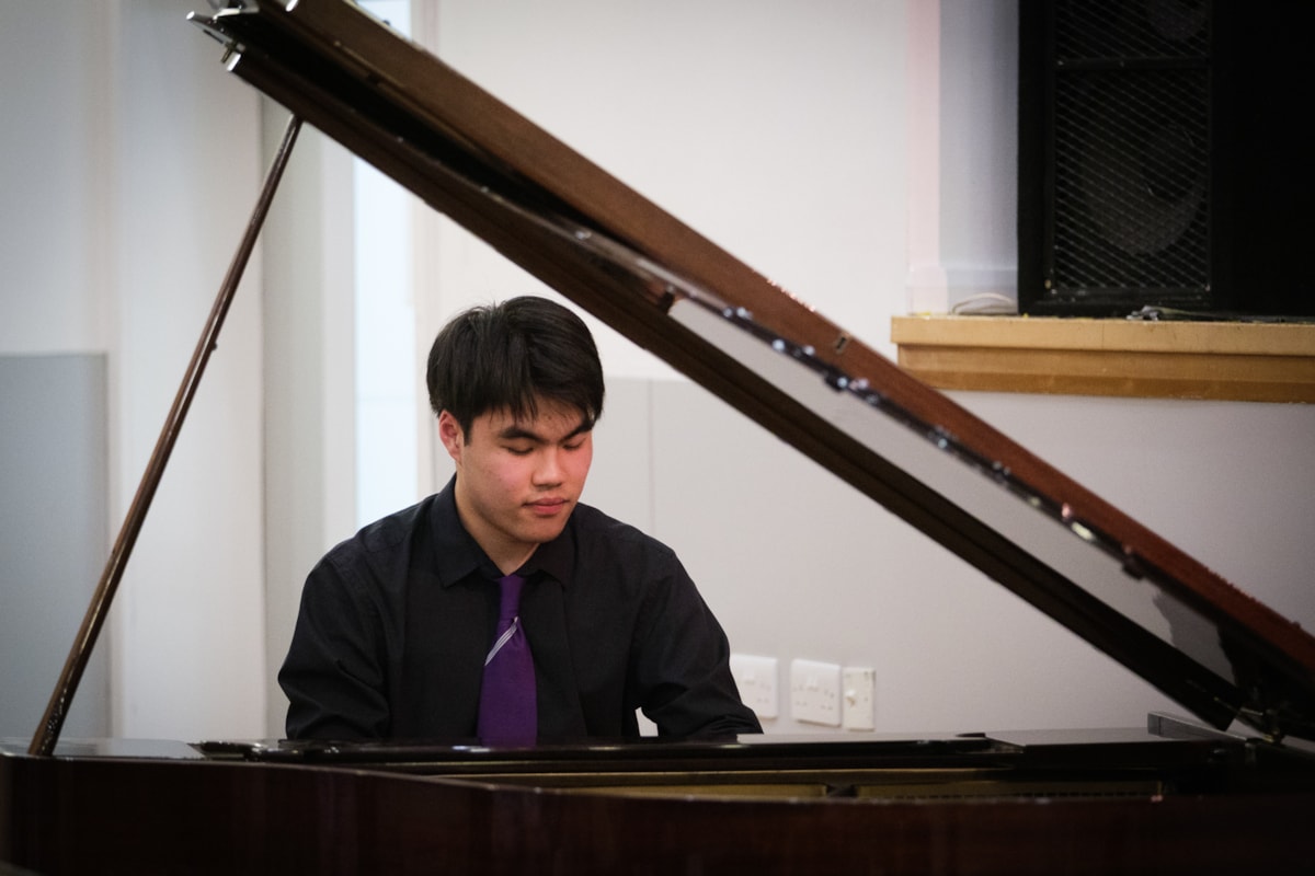 Ethan performing in the final