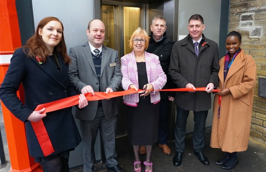 Access for All at Bingley station: (L-R): Nicola Wright, Network Rail commercial scheme sponsor; John Kitching, Northern Rail station manager; Cllr Val Slater, Executive Member for Housing, Planning and Transport at City of Bradford Metropolitan District Council; Steve Watson, Network Rail scheme project manager; Neil Moore, senior transport planner at City of Bradford Metropolitan District Council, and Marion Osieyo from the Department for Transport, officially open the new lifts at Bingley station.