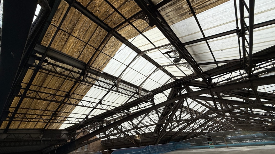View from inside the station – discoloured old panel on the left, new panel on the right