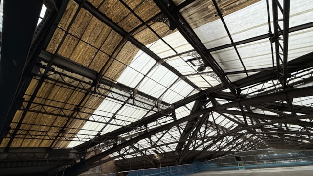 View from inside the station – discoloured old panel on the left, new panel on the right