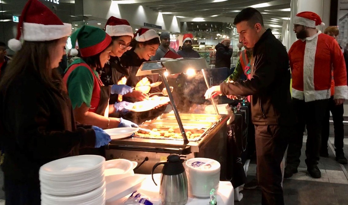 Christmas Eve dinner at New Street station for Birmingham’s homeless: Birmingham New Street Christmas Eve meal 2018 - food being served