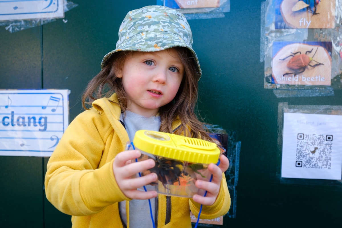 Outdoor play is supported with QR Codes for independent learning