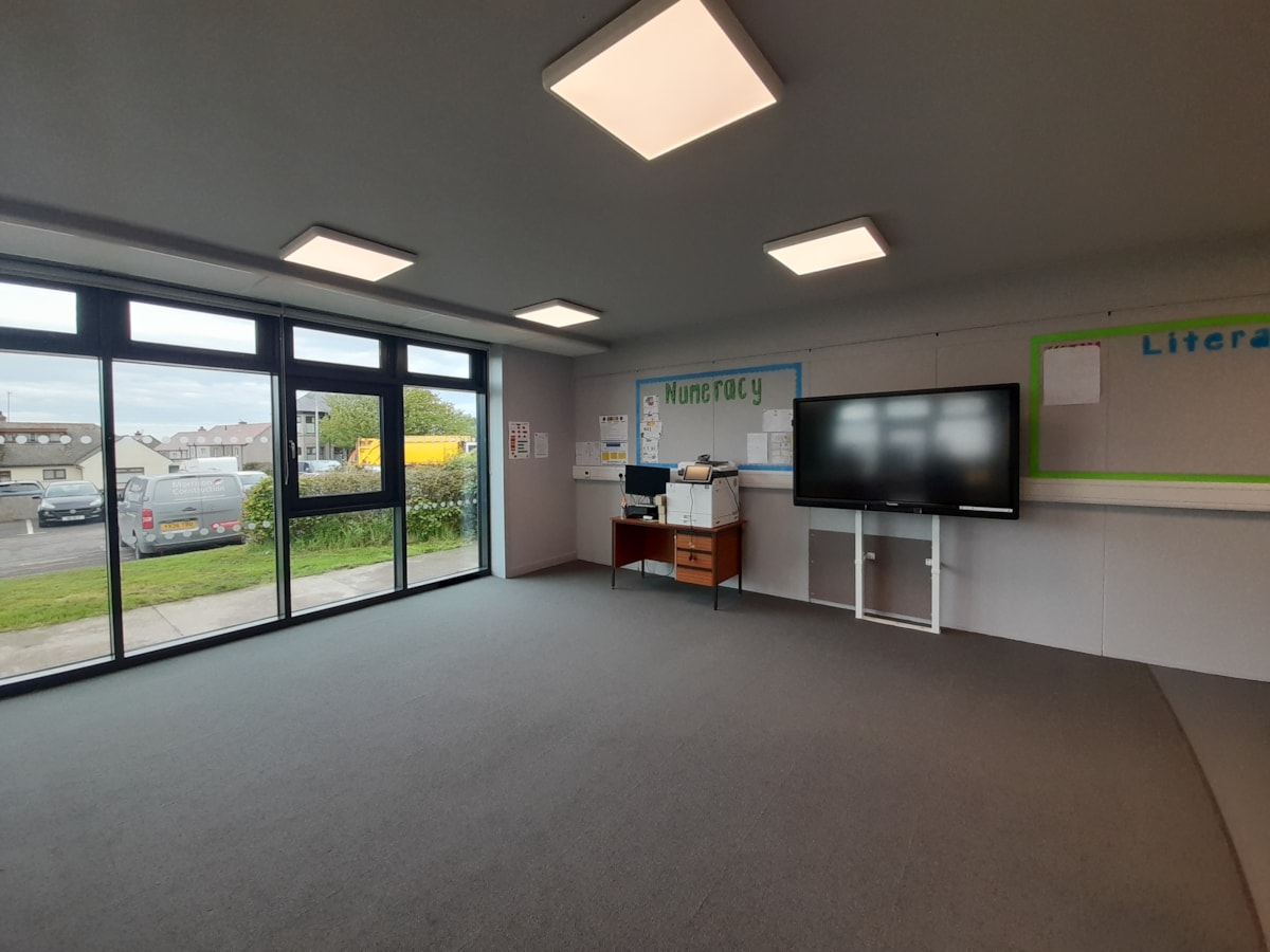 Refurbished learning space at Cullen Primary School, featuring new windows, improved lighting and flooring.