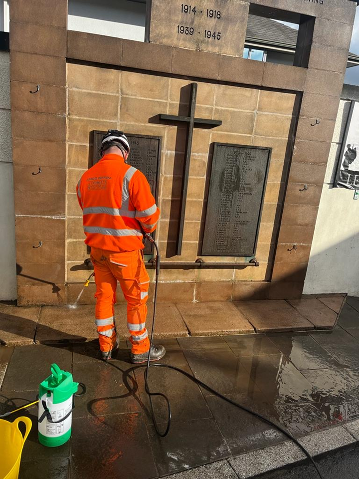 Cleaning one of the war memorials