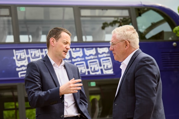 First Bus Scotland MD Duncan Cameron and Kenneth Gibson MSP discuss the need for investment in road infrastructure outside Holyrood