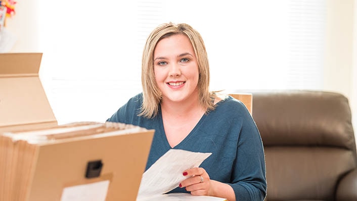 Social service worker (image): A woman smiling at the camera