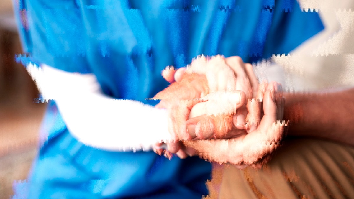 Flu vaccine programme 2025 image: Flu vaccine programme 2025 image with two pairs of hands holding one another.