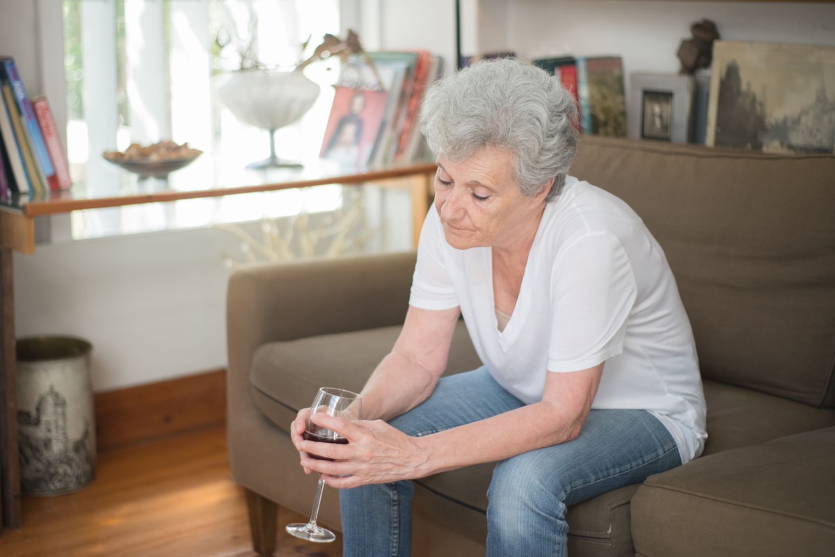 Woman with glass of wine