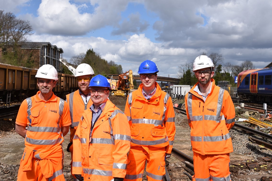 Cllr Paul Spooner and Cllr Matt Furniss join Network Rail's engineers on site at Guildford station