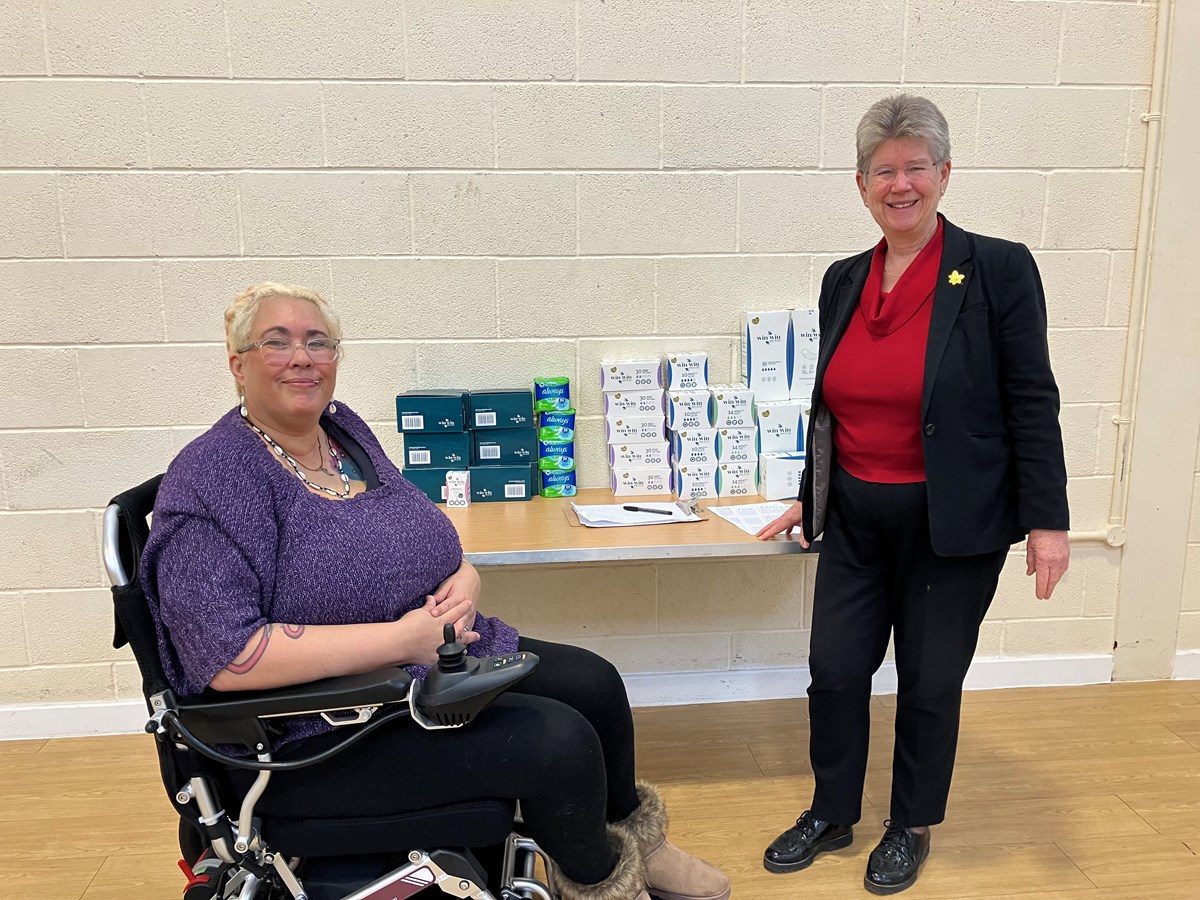 Minister for Social Justice, Jane Hutt and Dee Dickens who has campaigned for period dignity, at Glyncoch Community Centre, with free period products available to those who need them.