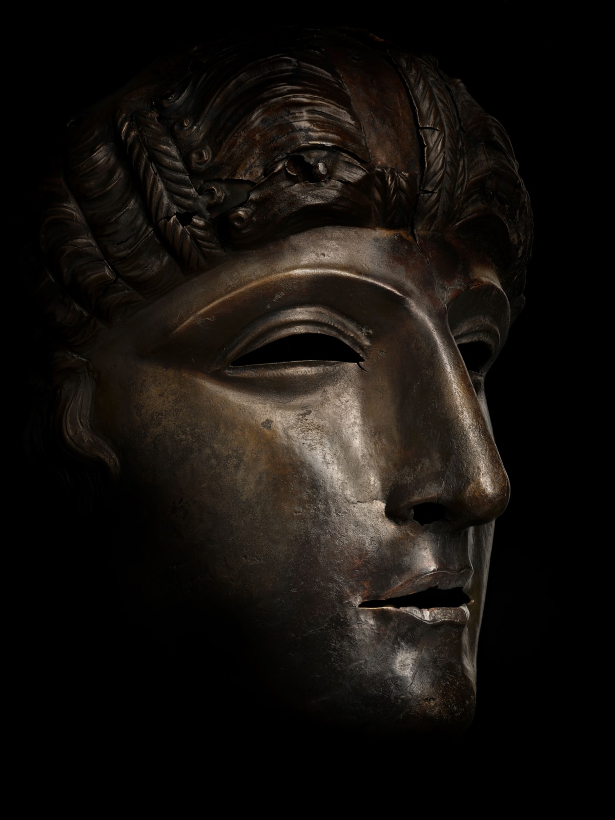 Bronze facemask, Newstead, late 1st Century AD. Image © National Museums Scotland 2