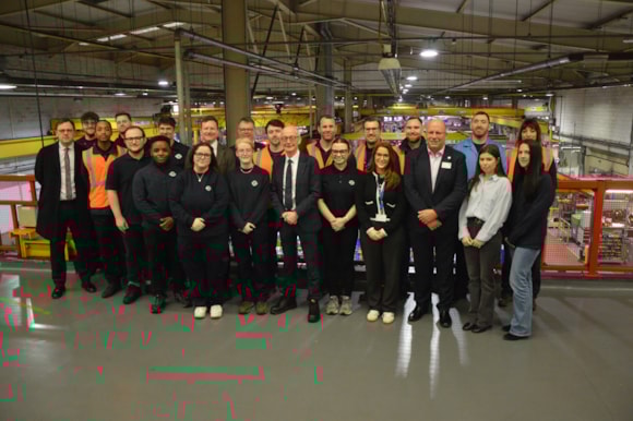 Transport for London’s apprenticeships open up a range of careers: DWP Image - Pat McFadden MP, Secretary of State for Work and Pensions, Andy Lord, TfL Commissioner and TfL apprentices at Acton Works