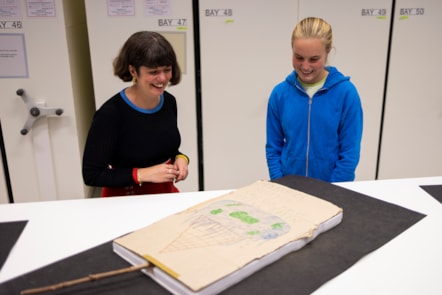 Bridget tells Curator Mhairi Maxwell abour her climate protest placard at the National Museums Colletion Centre. Photo (c) Duncan McGlynn (4)