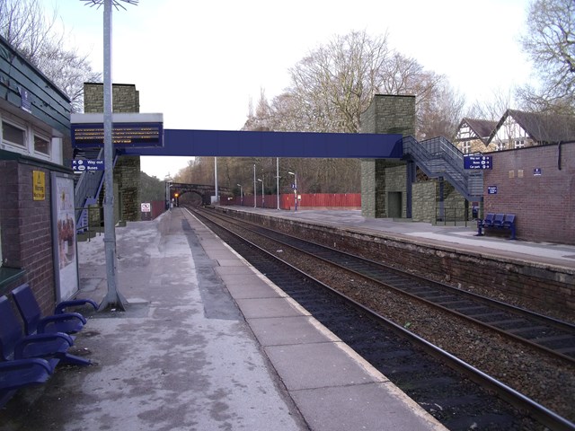 Marple station Access for All project: CGI of the new stone-clad lift towers and linking overbridge proposed for Marple station.