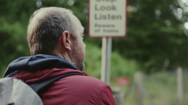 Dad at level crossing