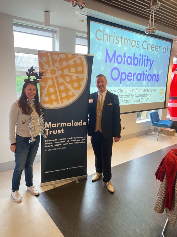 BristolChristmas2024-momt: Amy Perrin, CEO and Founder of Marmalade Trust, and Ryan Gold, organiser of the lunch at Motability Operations