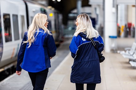 This image shows two female Northern staff members at a station