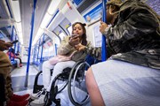 TfL Image - Wheelchair user travelling on the Tube: TfL Image - Wheelchair user travelling on the Tube