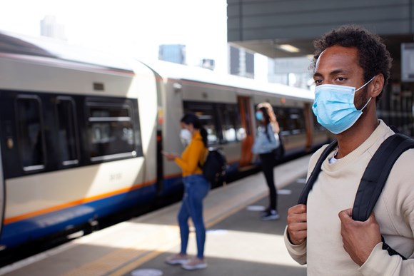 TfL Image - Man wearing face covering on London Overground platform