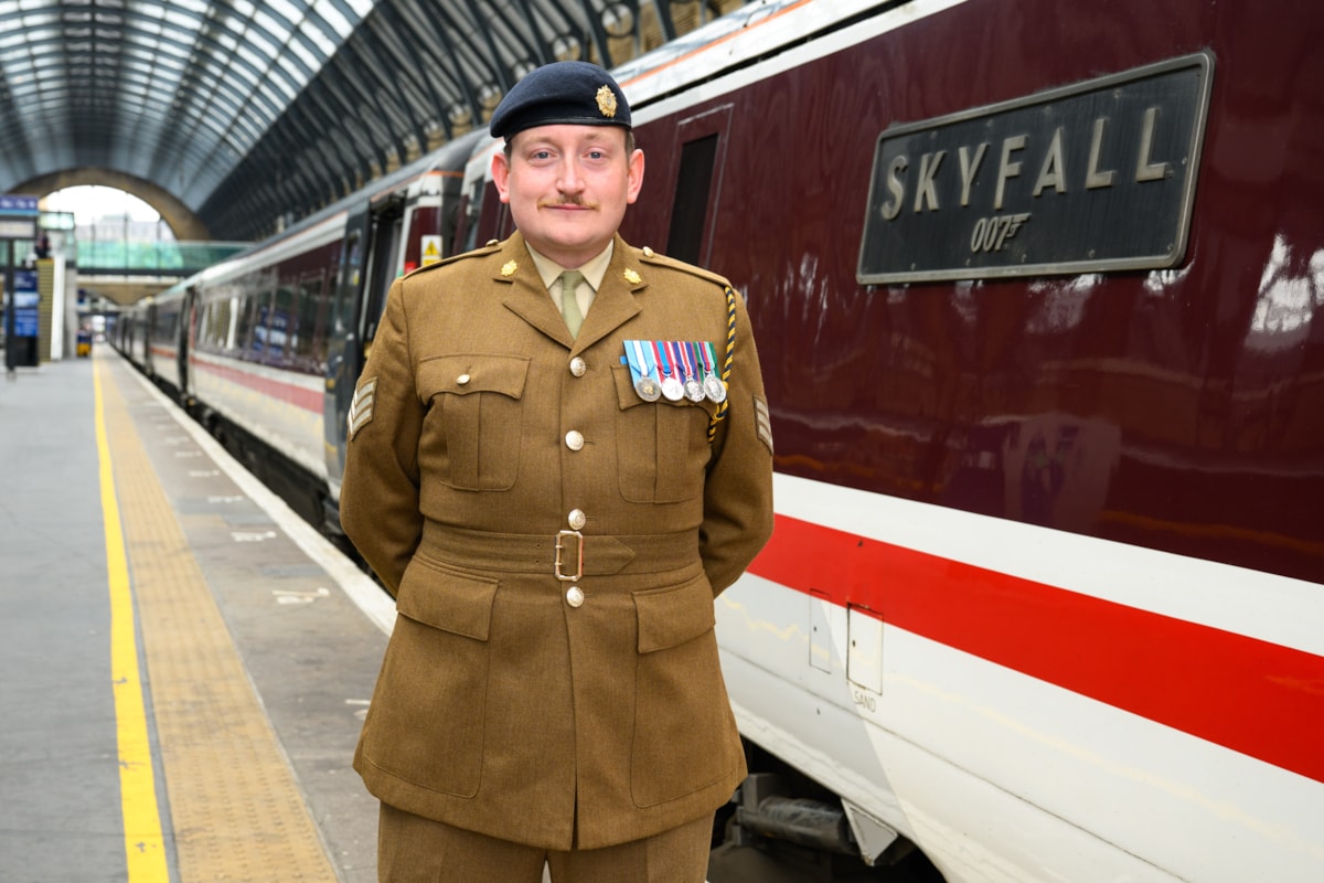 LNER drive Jamie Bond next to LNER Class 91 'Skyfall'