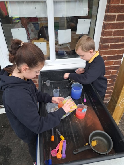 Pupils Scarlett and Thomas enjoy an activity at the Orchard, a new SEND unit at Thornton Primary School