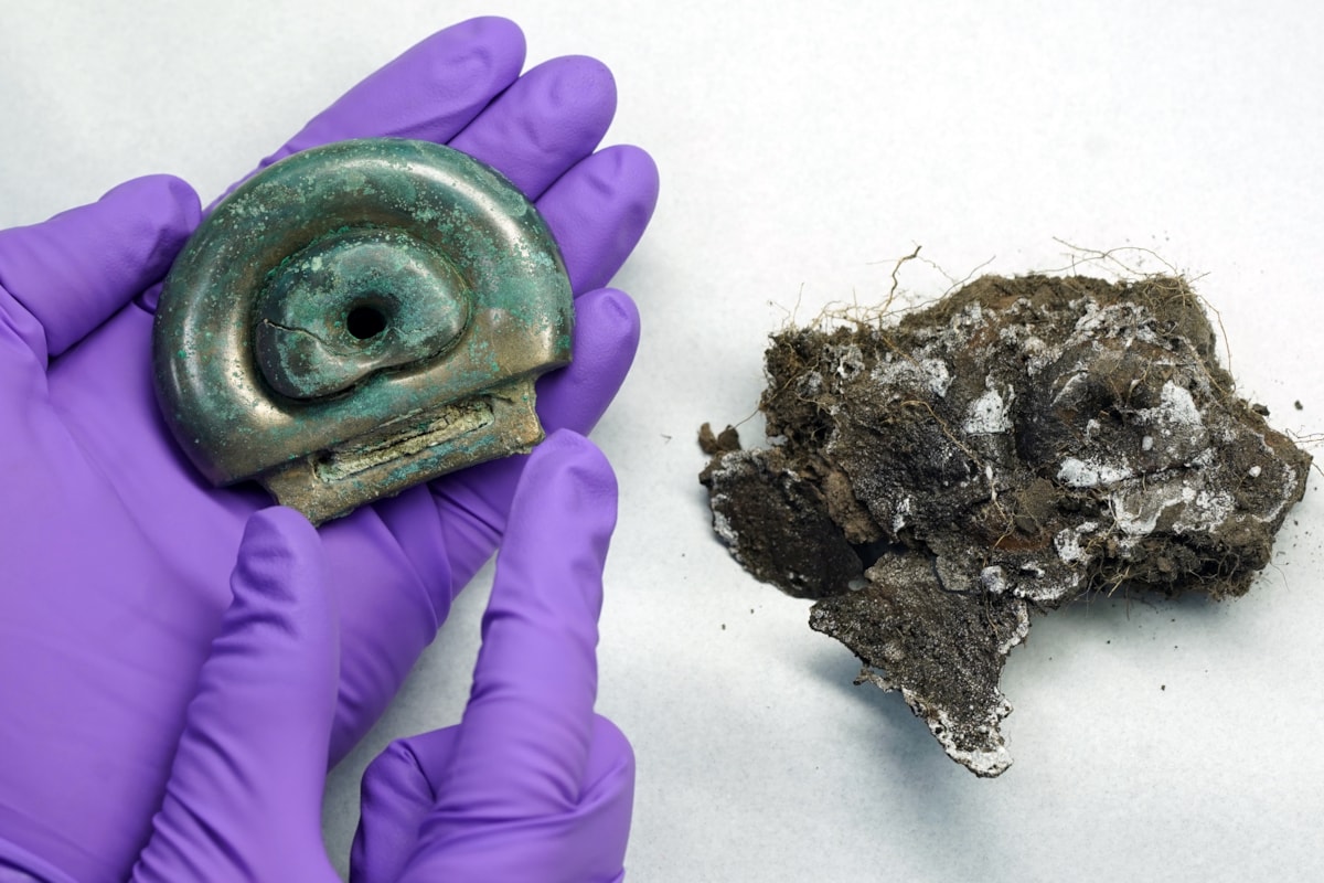 A clay mould from the Blyth Hoard and a fitting from the Peebles Hoard that the mould was used to make Image credit Stewart Attwood