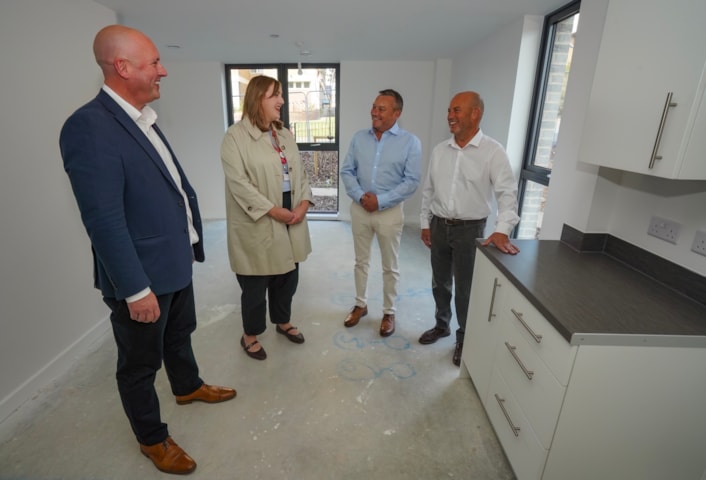 Tour-39: Left to right: David Wingfield (managing director of Construction East at Wates), Councillor Jess Lennox (Leeds City Council’s executive member for housing), Darren Quarmby and Damian Quarmby take a tour of the new housing development.